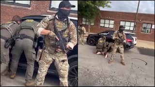 WATCH: Chicago Woman Dragged From Car By Armed Federal Agents During Immigration Raid