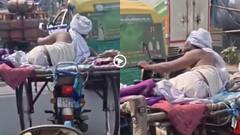 Video: और क्या-क्या देखने को मिलेगा? बाइक पर फिट कर दी चारपाई, लेटकर चलाता दिखा शख्स