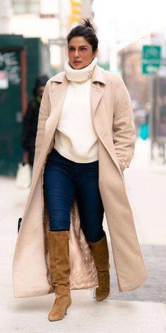 If you want to carry a long coat, then you can try this look of Priyanka. He is wearing a highneck with denim with which he has carried a coat. Also, she has made her look classy by wearing boots.