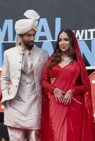 Avika looked beautiful wearing a red saree while Milind also looked handsome in a sherwani.