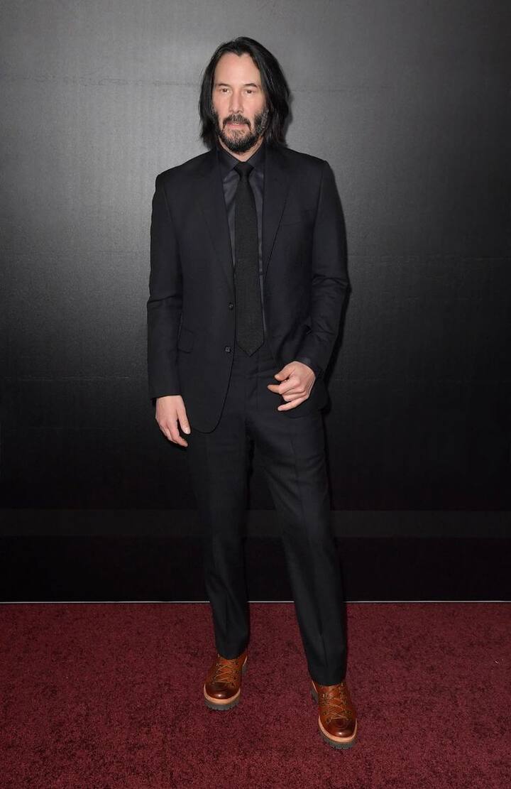 The Rugged Gentleman : Keenu Reaves embodies the purest form of masculine minimalism. His black outfits are built on structure, simplicity, and confidence. Whether he’s in a leather jacket, crisp turtleneck, or sharply tailored suit, his look never feels forced. There’s no need for embellishment — his presence is enough. (All Image: Special Arrangement)