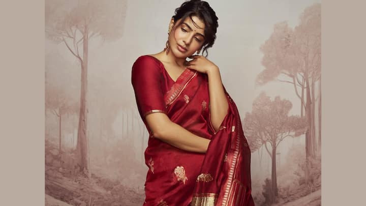 Samantha Prabhu embodies grace in this deep red silk saree featuring subtle gold zari work and a wide border. With minimal jewellery and softly styled hair, she showcases how simplicity can redefine elegance, making it ideal for weddings or cultural celebrations. (Image Source: Instagram/ samantharuthprabhuoffl)
