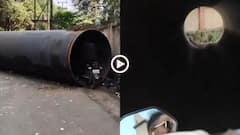 Video: बीच सड़क गिरा लोहे का पाइक, उसी के अंदर से बाइक घुसा ले गए लोग, बेंगलुरू का वीडियो वायरल
