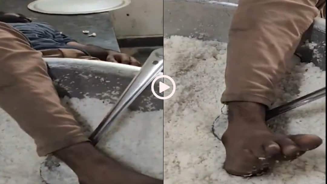 Video: बच्चों के लिए पके चावलों में पैर डालकर सोया चौकीदार, तेलंगाना मचा बवाल... देखें वीडियो watchman Government Polytechnic College hostel inTelangana Viral Video asleep drunk feet in cooked rice Video: बच्चों के लिए पके चावलों में पैर डालकर सोया चौकीदार, तेलंगाना मचा बवाल... देखें वीडियो