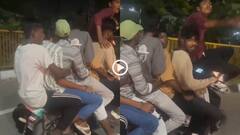 Video: स्कूटी पर एक साथ सवार हुए 7 युवक, जगह नहीं मिली तो एक हैंडल पर बैठा, वीडियो वायरल
