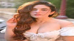 Aditi Budhathoki Pics: વ્હાઈટ ડ્રેસમાં અદિતીએ કેમેરા સામે ફ્લોન્ટ કર્યું ક્લિવેજ, જુઓ તસવીરો