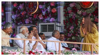Aishwarya Rai Touches PM Modi’s Feet After Speech On Humanity At Sathya Sai Baba Event