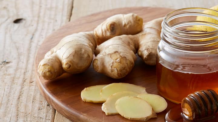 Ginger and Honey: Crush fresh ginger. Mix with raw honey. Wait twenty minutes. Don't skip the wait that's when gingerol becomes the compound that stops bacteria from colonizing the throat. Most people take it too soon. One spoonful when the throat first feels scratchy, not when it's already on fire. Timing matters more than amount. (Image Source: Canva)