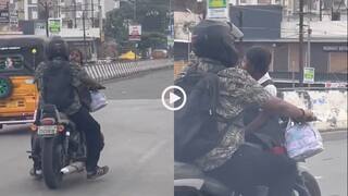 Video: यह क्यूट नहीं, खतरनाक है! बाइक की टंकी पर उल्टा बिठा बेटी को स्कूल छोड़ने गया शख्स, वीडियो वायरल