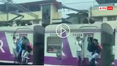 Video: ट्रेन के गेट पर लटका था युवक, पोल से टकराकट ट्रेक पर गिरा, दिल दहला देगा मुंबई का वीडियो