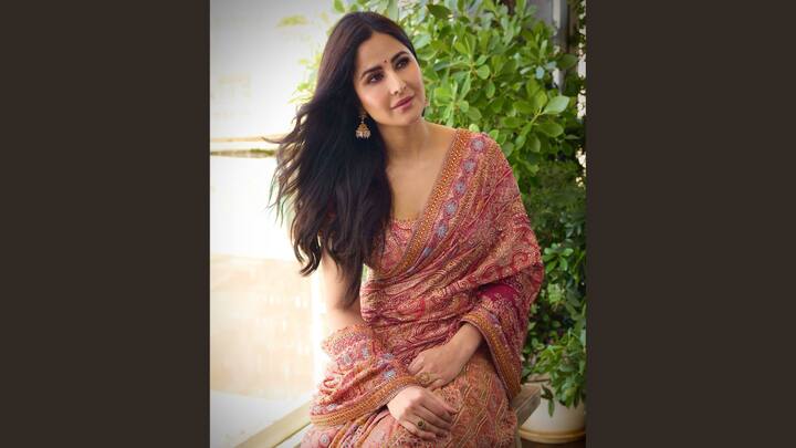 Katrina kept it classic in this bright two-toned Kashida saree featuring mirror work, sequins, and signature paisley motifs. The subtle zari, gota, and kundan accents added timeless charm. Paired with a hand-embroidered blouse, her understated styling exuded effortless elegance. (Image Source: Instagram/ taruntahiliani)