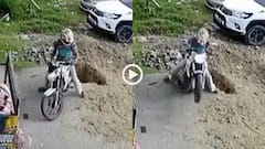 Video: ज्यादा पीछे हो गई! बाइक बैक करते वक्त गहरे गड्ढे में गिरा शख्स, CCTV फुटेज वायरल
