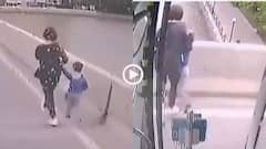 Video: बच्चे को हाथ में लिए पुल से कूद रही थी महिला, बस रोककर बचाने भागा ड्राइवर, देखें वीडियो