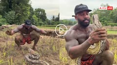 Video: 21 फीट लंबे अजगर को पकड़ता दिखा शख्स, दोनों हाथों से दबा दिया मुंह, रोंगटे खड़े कर देगा वीडियो!