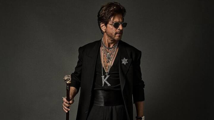 Shah Rukh Khan made a commanding first appearance at the Met Gala 2025 in a custom black Sabyasachi suit that radiated understated luxury. The highlight was his dramatic layered jewellery, featuring bold gold chains and an oversized 'K' pendant symbolising 'King Khan.' His look blended classic tailoring with a statement-making personal touch. SRK’s debut reminded the world why he remains India’s ultimate style icon. (Image Source: Instagram/ sabyasachiofficial)