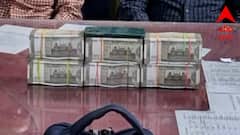 বর্ধমান স্টেশনে চলন্ত ট্রেন থেকে নামতে দেখে সন্দেহ, ট্রলি খুলতেই পাওয়া গেল থরে থরে সাজানো নোট!