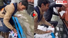 पानी में पलटा आईफोन से भरा कंटेनर, लूटने नाव लेकर आ गए ग्रामीण: जमकर मचाया गदर- वीडियो वायरल