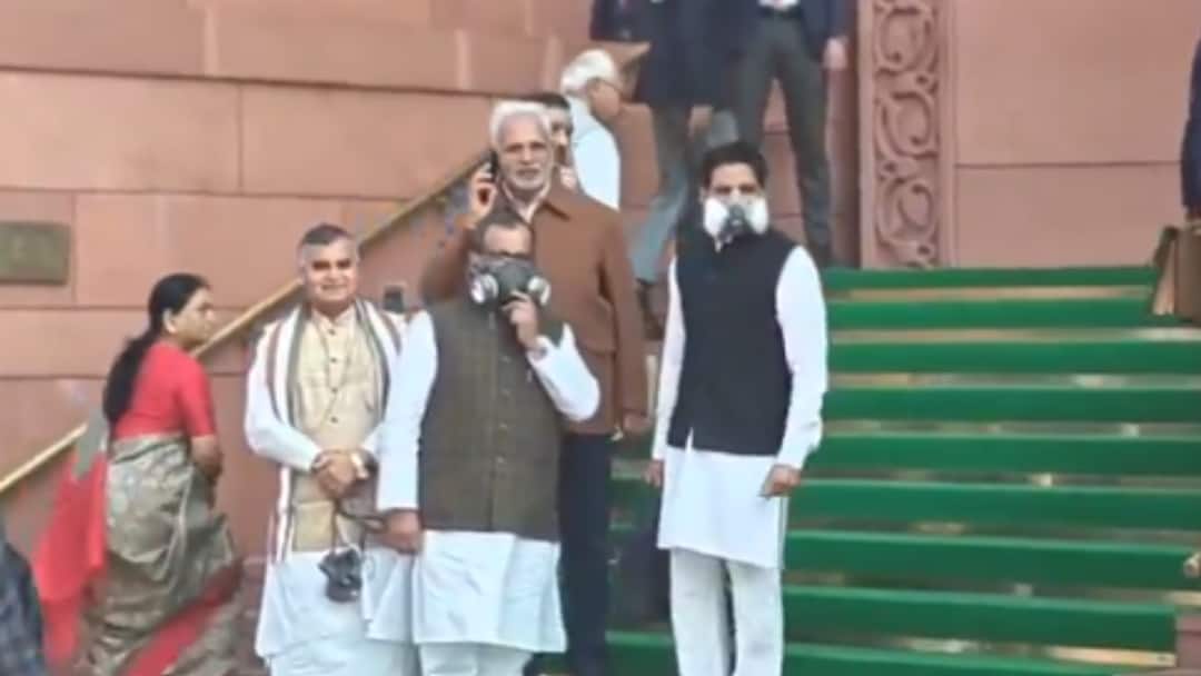 WATCH: Opposition MPs Wear Gas Masks Inside Parliament During Winter Session To Protest Delhi’s Toxic Air