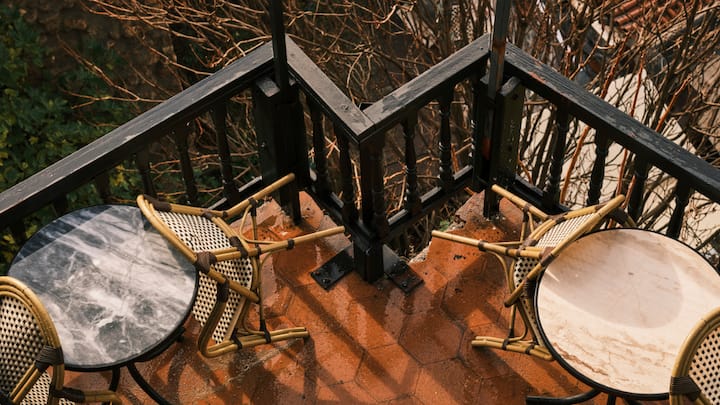 Personality to Floor Patterns: Anyone who steps onto a balcony with beautiful flooring is instantly uplifted by the lifestyle aesthetics it promotes. Elements such as Moroccan tiles, textured stones, and geometric ceramics can add character and visual intrigue to the space. Well-crafted flooring encourages the residents to step outside and utilize the balcony space more frequently. (Image Source: Canva)