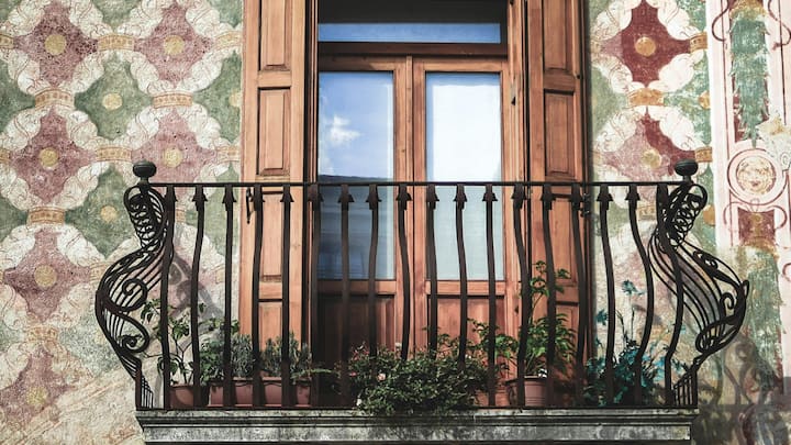 Lush Green Corners - Bringing Wellness Home: A balcony is overfilled with the fullness of living and forms a zone of rejuvenation. vertical garden, home grown herbs, and flora, it is an oasis of well being. a pocket of wellness - stress relief, filtration of the air, soothing greenery for the visual - the perfect calm for the day, it is wellness. (Image Source: Canva)