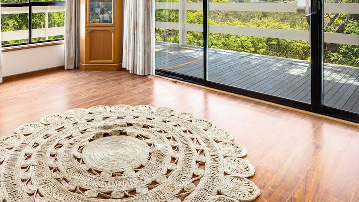 Fabrics and Patterns That Provide Comfort Outside: The addition of outdoor-friendly rugs, cushions, and throws make balconies stylish annexes of the living room. These soft furnishings create a space that is warm, inviting, and perfect for relaxation, with a seamless blend of the outdoor life and the comfort of indoors. (Image Source: Canva)