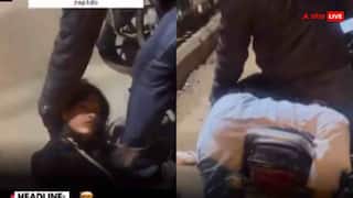 रैपिडो पर बैठ भी नहीं पा रही... नशे में धुत दिल्ली की लड़की का वीडियो वायरल, भड़के यूजर्स