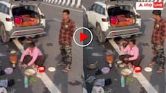 नेशनल हाईवे किनारे गाड़ी खड़ी कर खाना बनाता दिखा परिवार, वायरल वीडियो देख आग बबूला हो गए यूजर्स