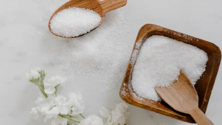 Consumption of More Salt and Processed Foods: Soups, packaged snacks, and pickles are common foods in winter and usually contain a lot of salt. Excessive salt retention raises blood pressure, hence is one of those subtle winter habits that damages heart health. (Image Source: Canva)