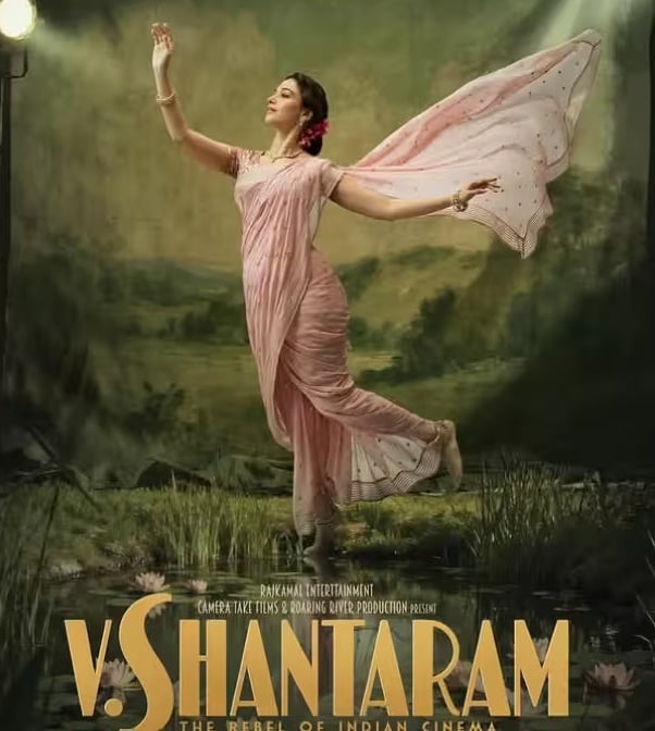 तमन्नाह आगामी फिल्म वी शांतराम में नजर आएंगी। वह वी शांतराम की पत्नी की भूमिका निभाएंगी। फिल्म से उनका पहला लुक जारी कर दिया गया है।