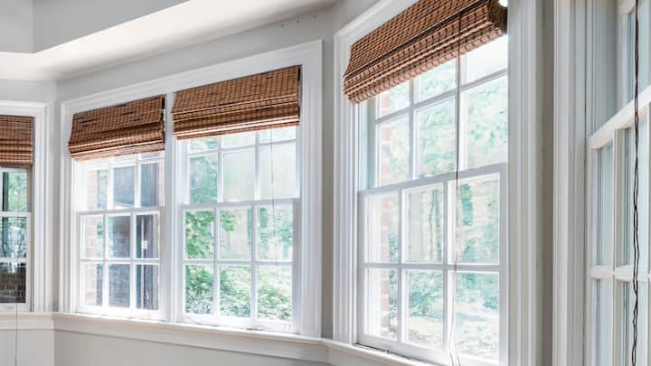 Casement Windows: A strong, clear glass frame enables good airflow & lots of natural light to illuminate rooms while showcasing Christmas décor, holiday wreaths, holiday lights, and any other decorations being placed in a clean, open area. (Image Source: Canva)