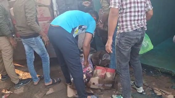 Video: અમદાવાદના સાણંદમાં 31st પહેલાં દારૂની રેલમછેલ, ટ્રક પલટી જતાં લોકોએ લૂંટ ચલાવી, પોલીસ દોડતી થઈ