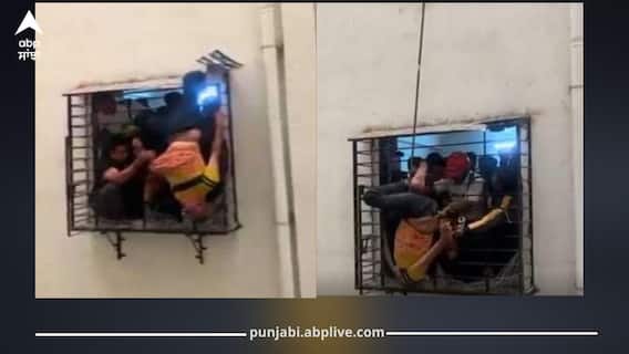 ਬਿਸਤਰ ‘ਤੇ ਬੈਠਿਆ ਸੀ ਸਖਸ਼, ਅਚਾਨਕ 10ਵੀਂ ਮੰਜ਼ਿਲ ਤੋਂ ਫਿਸਲ ਕੇ 8ਵੇਂ ਫਲੋਰ ‘ਤੇ ਲਟਕਿਆ…ਇੱਕ ਘੰਟੇ ਤੱਕ ਹਵਾ 'ਚ ਅਟਕੀ ਰਹੀ ਜਾਨ