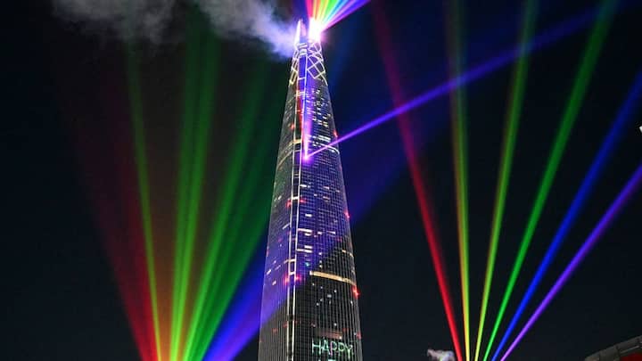 Fireworks and light displays illuminate the Seoul skyline as South Korea welcomes the New Year 2026, with crowds gathering across the capital for midnight celebrations.