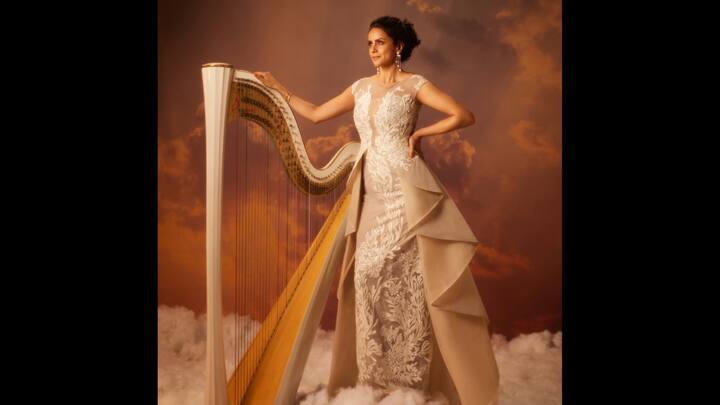 1. ⁠Heavenly Couture In Sculptural Ivory Gown: Actor Gul Panag stuns in an ethereal, almost otherworldly look. Set against a dreamlike backdrop of clouds and warm celestial hues, Gul’s look is nothing short of high-fashion fantasy meets red-carpet elegance. With this heavenly ivory ensemble, Gul Panag delivers a striking visual that blurs the line between fashion and art. Regal, sculptural and timeless, the look cements her place as a celebrity who understands the power of fashion storytelling. Her Ivory floor-length gown features delicate lace embroidery that runs through the fitted silhouette, adding texture and depth. It has a peplum-inspired structure that adds volume and movement, elevating the gown into a statement piece. The neutral ivory palette enhances the intricate craftsmanship, allowing the silhouette and detailing to take centre stage. (Image Source: Instagram/@gulpanag)