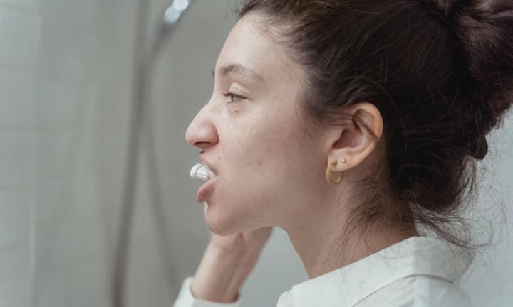 People often think that the harder they brush, the cleaner their teeth will be. But the reality is the opposite. If you brush with a hard brush or with excessive pressure, the enamel gradually starts wearing off. It is not detected initially, but with time the teeth become thin and sensitive.