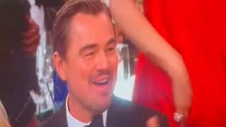 Leonardo DiCaprio’s Animated Off-Camera Moment Steals The Show At Golden Globes, Sparks K-Pop Theories