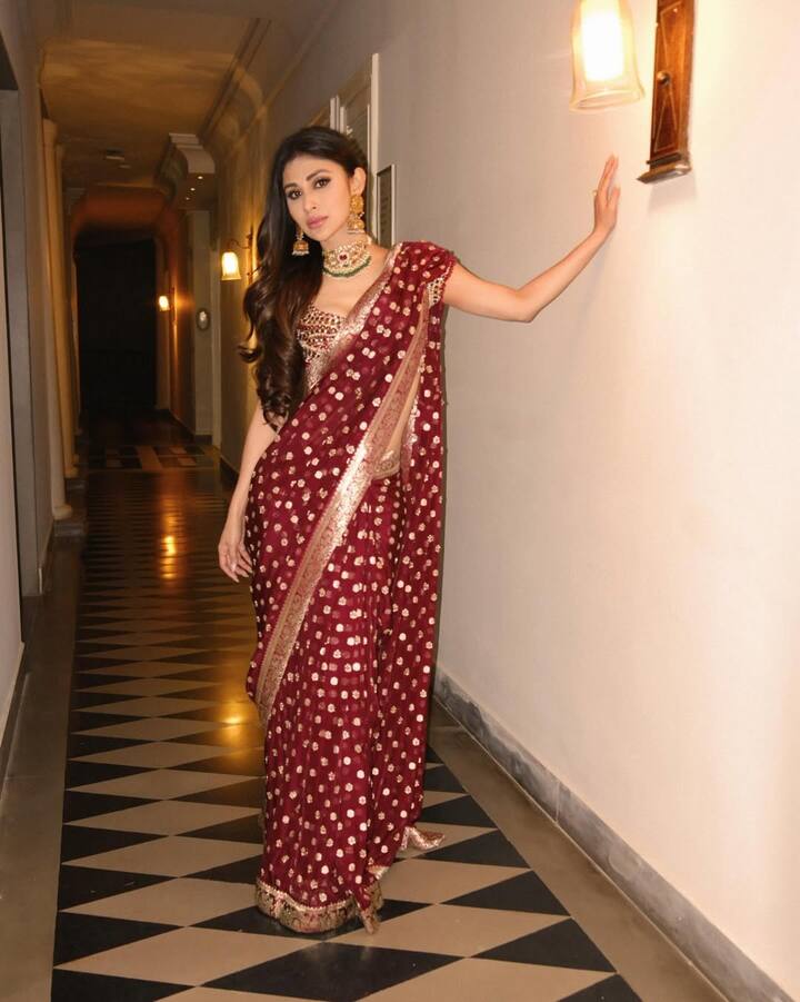 Talking about her look, the actress is wearing a red colored saree with golden work on it, which is adding to her look.