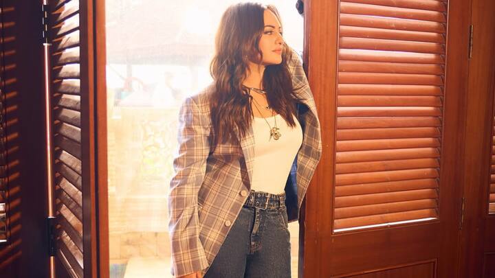Retro Plaid Meets Modern Cool: In this muted plaid blazer with a relaxed fit, Sonakshi channels vintage tailoring with a contemporary twist. Styled with a clean white tank and wide-leg denim, the blazer becomes the hero of this effortless, laid-back ensemble. (Image Source: Instagram/ aslisona)