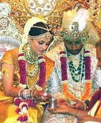 Aishwarya Rai Bachchan wore a golden Kanjeevaram saree at her wedding, which reportedly cost around Rs 75 lakh and was designed by Neeta Lulla.