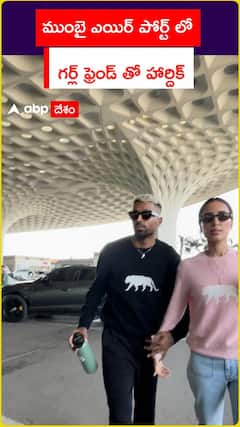 Hardik with his girlfriend at Mumbai airport