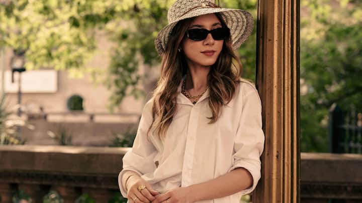 Accessorise Smartly: Accessories are the easiest way to transform a simple outfit into something memorable. Think bold sunglasses, statement earrings, or delicate layered necklaces that add just the right amount of charm. Even in the heat, minimal yet thoughtful pieces can enhance your look without feeling overwhelming. The right accessory can quietly pull your entire outfit together. (Image Source: Canva)