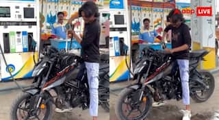 Viral Video : तेल की किल्लत के बीच पेट्रोल से बाइक धुलता नजर आया शख्स, वीडियो देख भड़के यूजर्स