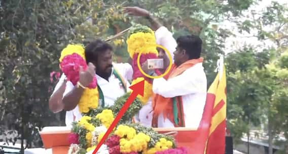 பறந்து வந்த செல்போன்.. அண்ணாமலை தலையில் விழுந்ததால், பிரச்சாரத்தி பரபரப்பு ! பறந்து வந்த செல்போன்.. அண்ணாமலை தலையில் விழுந்ததால், பிரச்சாரத்தி பரபரப்பு !