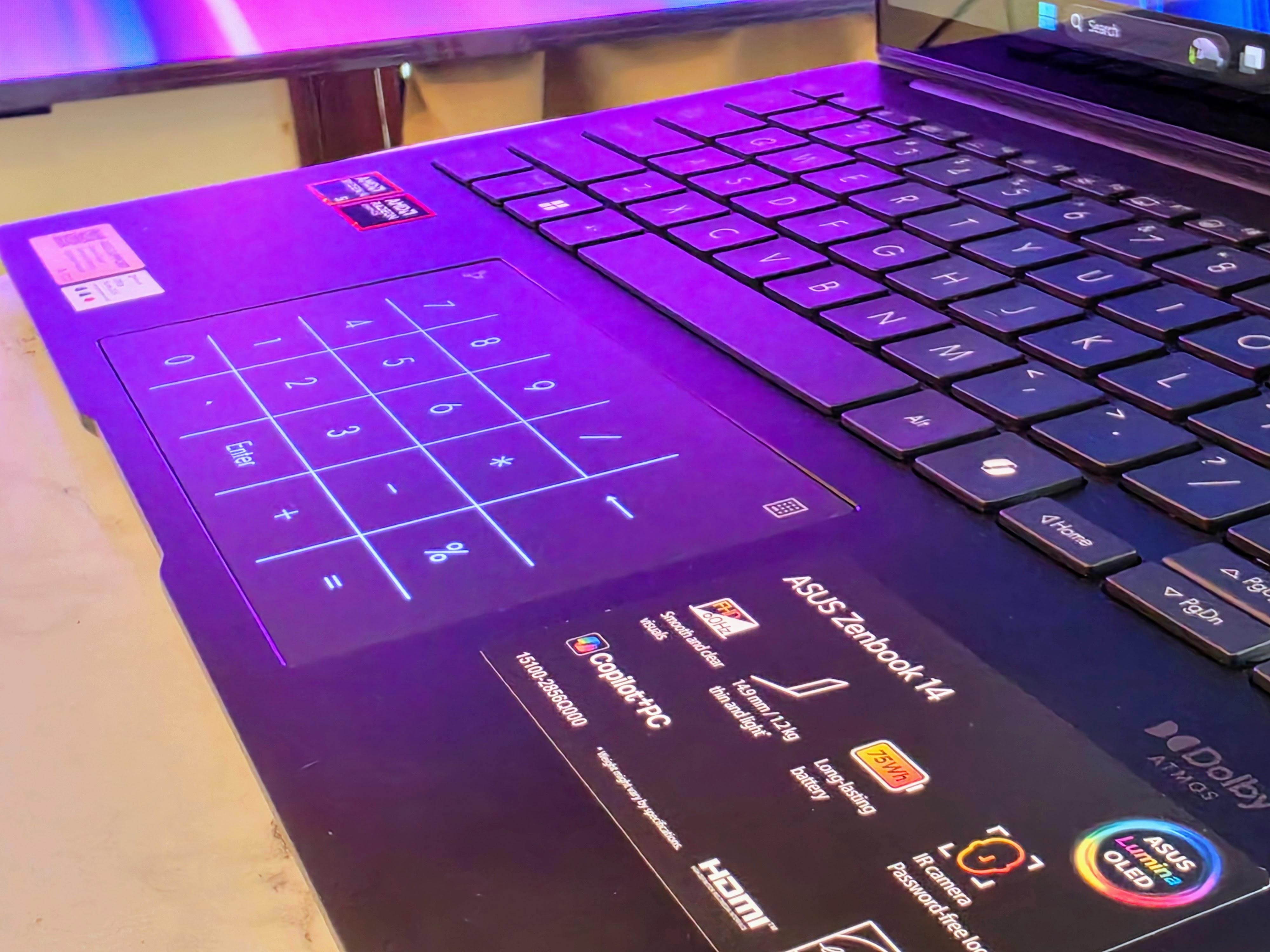 Asus Zenbook 14 Review: All That AI Talk, But It’s The Screen That Steals The Show