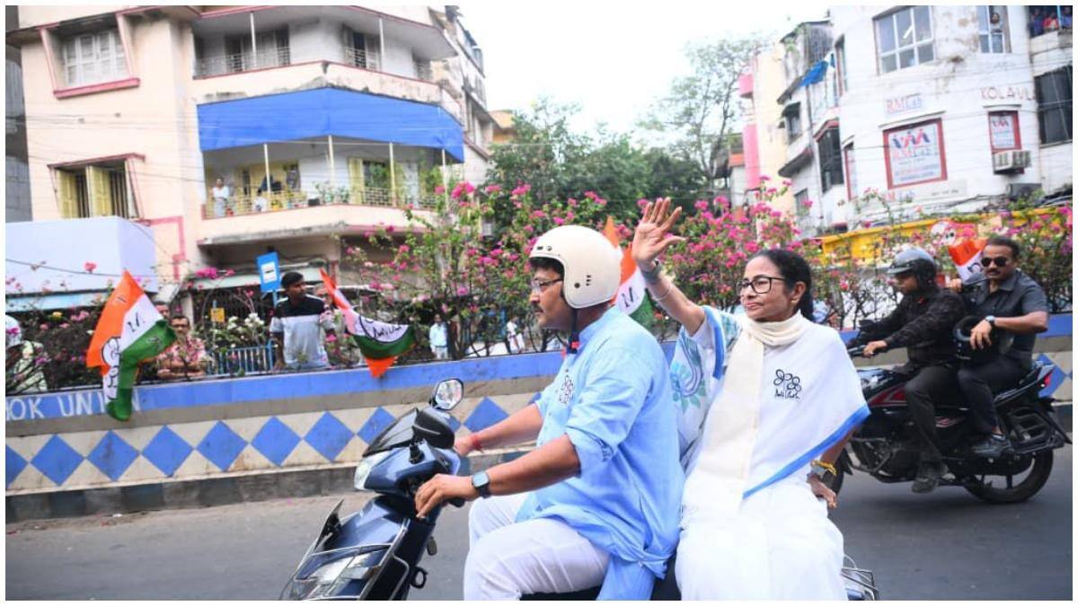 Mamata Rides Pillion On Bike In Kolkata Ahead of Phase 2 Polls | WATCH