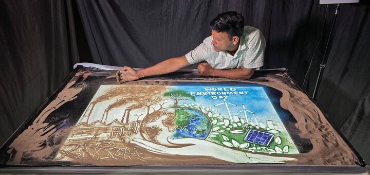 Renowned international sand artist Manas Kumar Sahu showcases a special sand animation on the occasion of World Environment Day, in Puri. (Image Source: ANI)