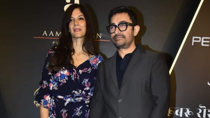 Aamir Khan is pictured alongside his longtime partner, Gauri Spratt. The couple was photographed holding hands while attending a grand milestone event in Mumbai celebrating 25 Glorious Years of Aamir Khan Productions. The celebration commemorated the legacy of iconic films like Lagaan.