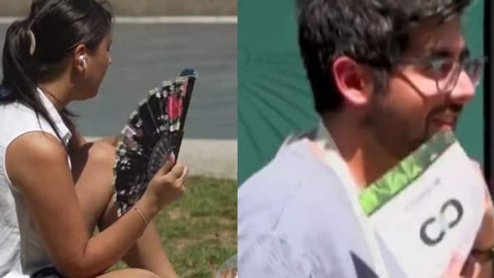 Many people are carrying handheld fans on the streets to stay cool amid Europe’s intense heatwave