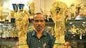 FIFA World Cup Trophy: ৫ কেজি সোনা দিয়ে তৈরি, ফুটবল বিশ্বকাপের ট্রফিটির দাম কত? নকশা তৈরি করেছিলেন কে?