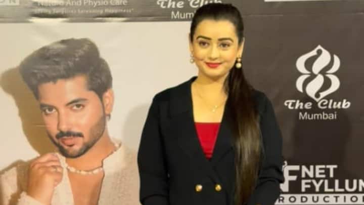 Chahat Pandey attending the birthday party in a black blazer dress featuring gold button details, paired with a small red quilted handbag.